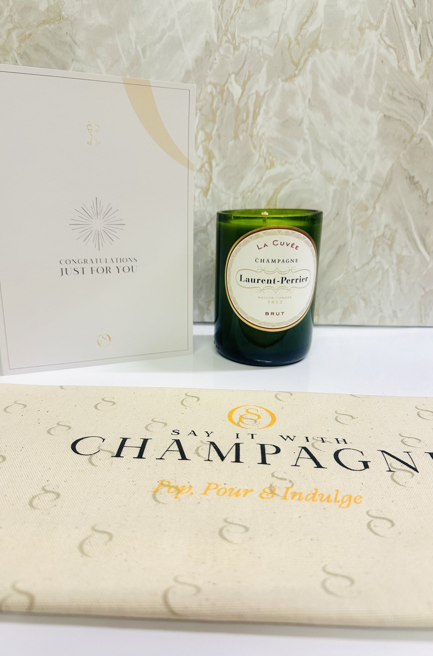 Laurent Perrier La Cuvée Brut Recycled Champagne bottle candle gift set